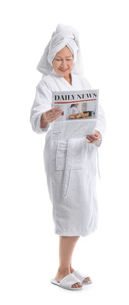 Mature Woman Bathrobe Newspaper White Background — Stock Photo, Image