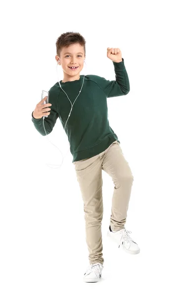 Netter Kleiner Junge Tanzt Und Hört Musik Vor Weißem Hintergrund — Stockfoto