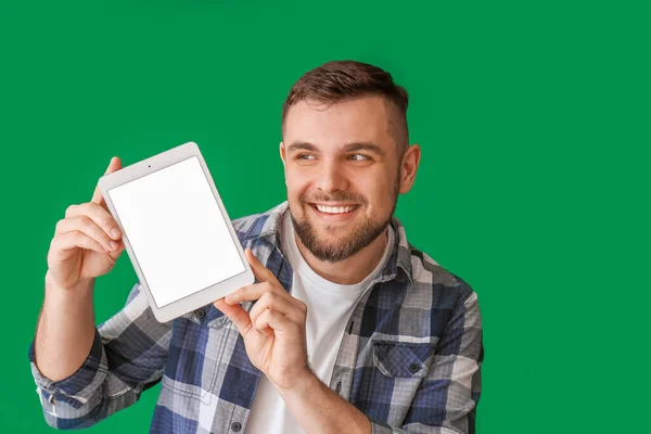 Young Man Tablet Computer Color Background — Stock Photo, Image