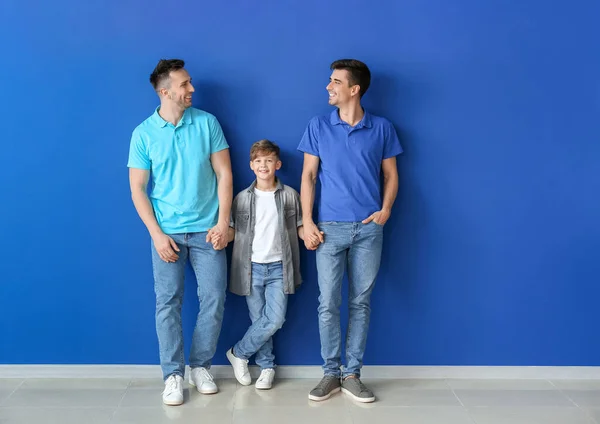 Happy Gay Couple Adopted Child Color Wall — Stock Photo, Image