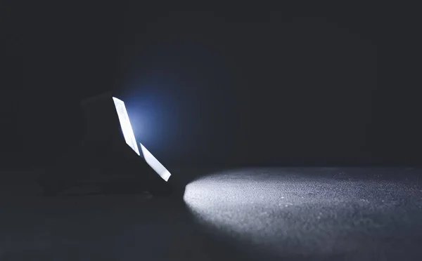 Glowing Modern Flashlight Dark Background — Stock Photo, Image