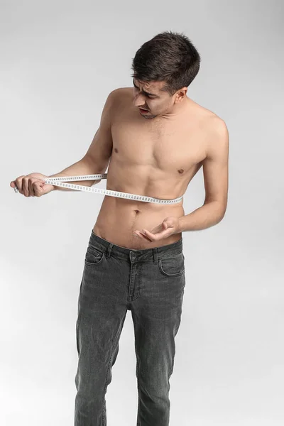 Sick Man Measuring His Waist Color Background Concept Anorexia — Stock Photo, Image