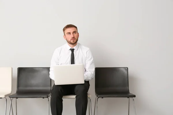 Man Waiting His Turn Indoors — Stock Photo, Image