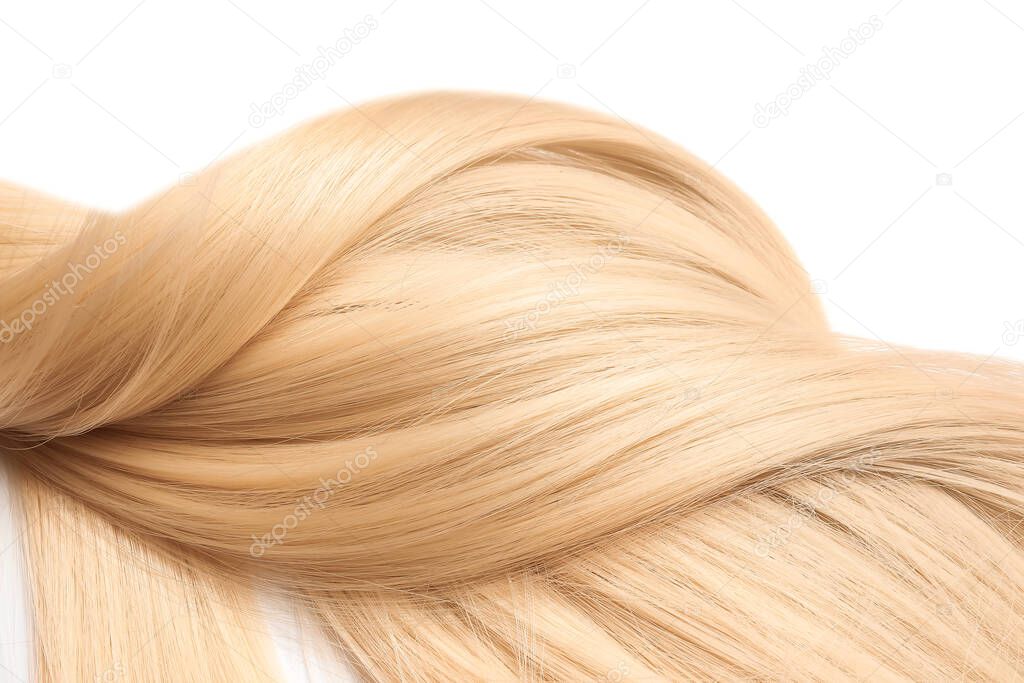 Beautiful long blonde hair on white background, closeup