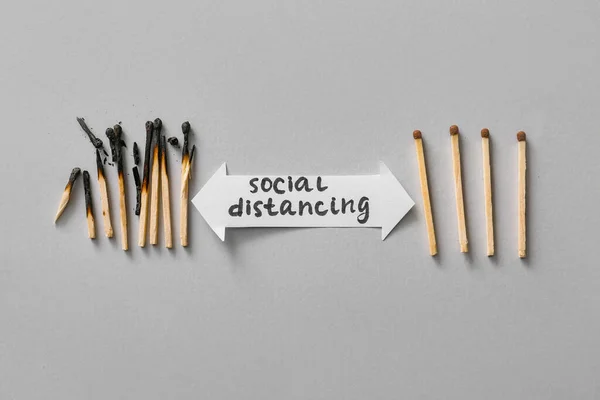 Burnt Out Unburnt Matches Text Social Distancing Grey Background — Stock Photo, Image