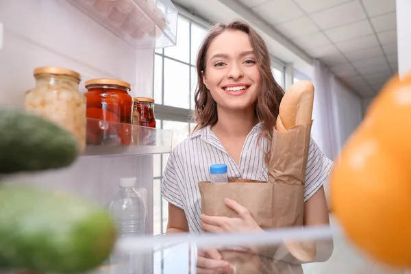 Young Woman Unpacking Fresh Products Market Kitchen View Fridge — Stock Photo, Image