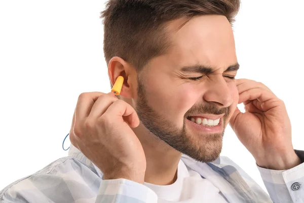 Young Man Ear Plugs Suffering Loud Noise White Background — Stock Photo, Image