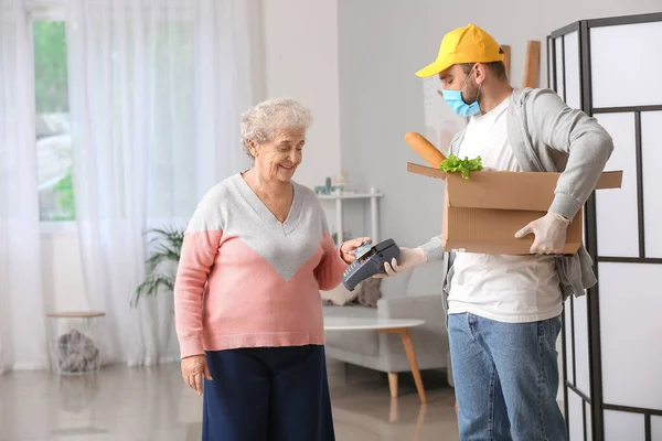 Elderly Woman Paying Courier Food Delivery Company Order Terminal Concept — Stock Photo, Image