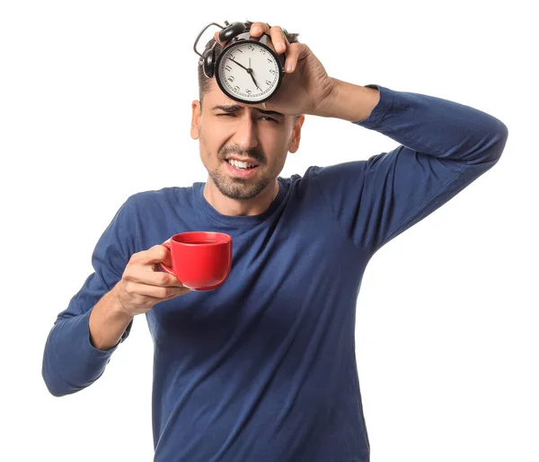Sleepy Young Man Cup Hot Coffee Alarm Clock White Background — Stock Photo, Image