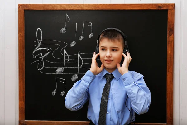 Young Cute Schoolboy Wearing Headphones Blackboard Musical Notes — Stock Photo, Image