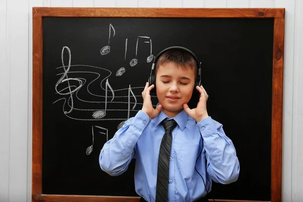 Young Cute Schoolboy Wearing Headphones Blackboard Musical Notes — Stock Photo, Image
