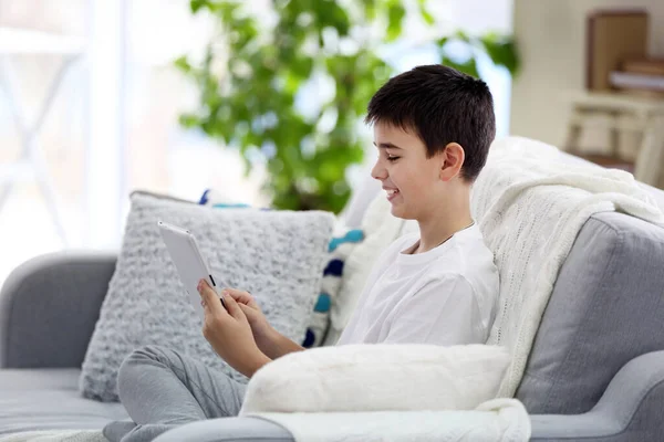 Little Boy Using Tablet Sofa Home — Stock Photo, Image