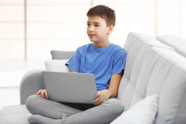 Little Boy Using Laptop Sofa Home — Stock Photo, Image