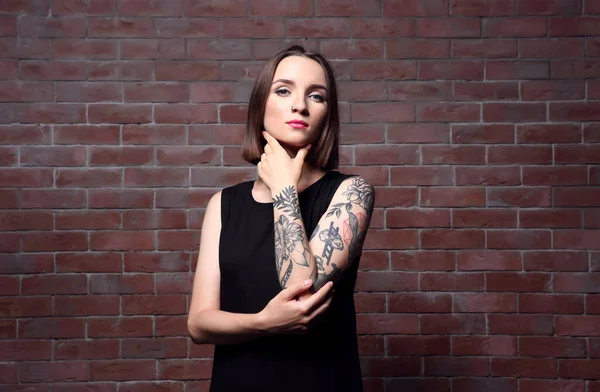 Beautiful Young Woman Tattoo Posing Brick Wall Background — Stock Photo, Image