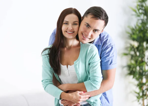 Happy Couple Hugging Home — Stock Photo, Image