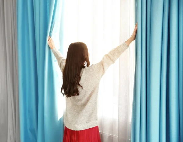 Girl Opening Curtains Home — Stock Photo, Image