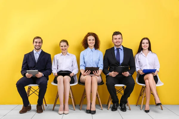 Group People Waiting Job Interview Yellow Wall Background — Stock Photo, Image
