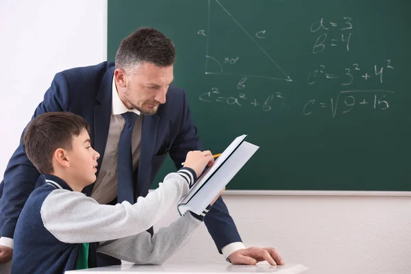 Male Teacher Schoolboy Doing Task Classroom — Stock Photo, Image