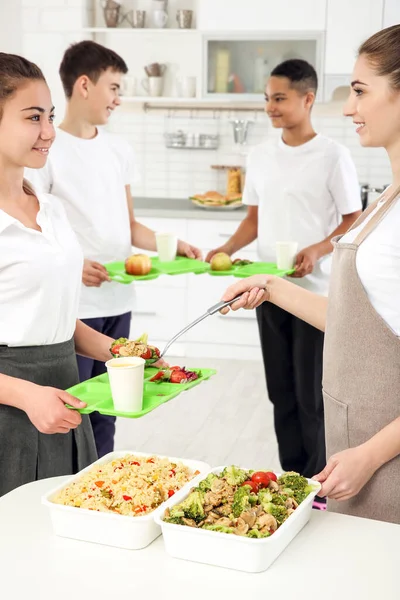 Young Woman Serving Lunch School Girl Canteen — Stock Photo, Image