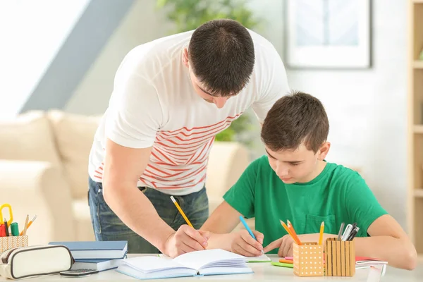 Father Son Doing Homework Together Indoors — Stock Photo, Image