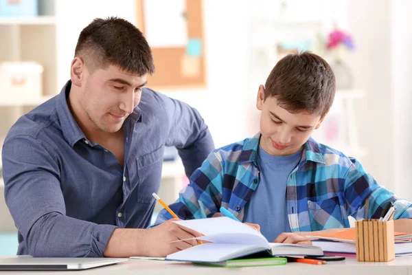 Father Son Doing Homework Together Indoors — Stock Photo, Image