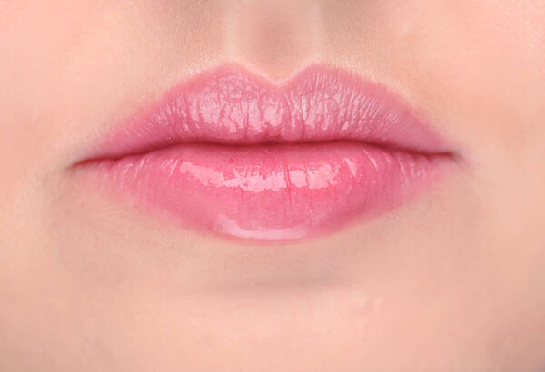 Lips of beautiful young woman, closeup