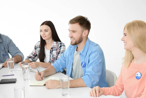 Meeting of young volunteers team in office