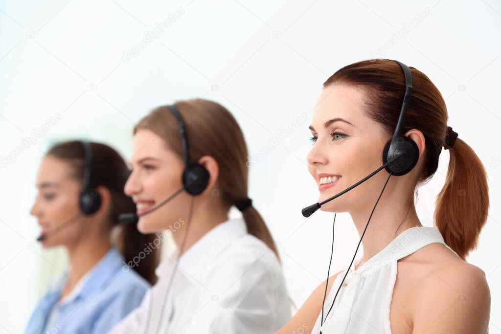 Team of technical support dispatchers working in office