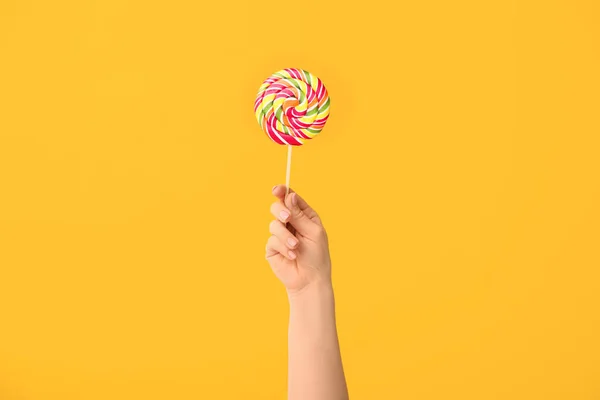 Hand Sweet Lollipop Color Background — Stock Photo, Image