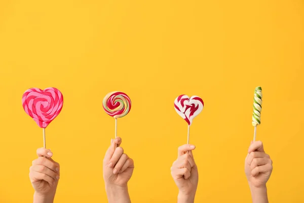 Hands Sweet Lollipops Color Background — Stock Photo, Image