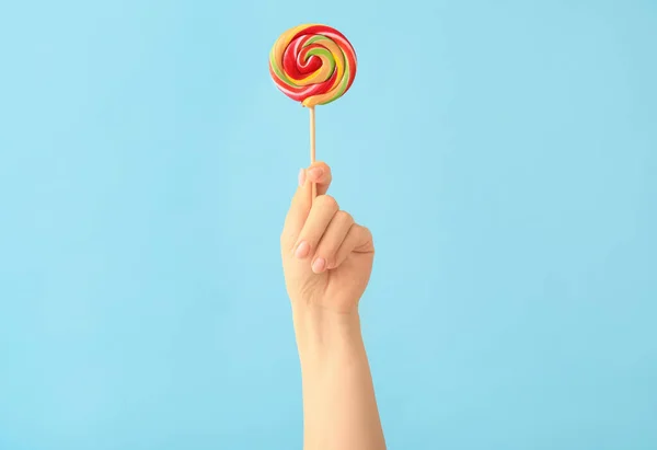 Hand Sweet Lollipop Color Background — Stock Photo, Image
