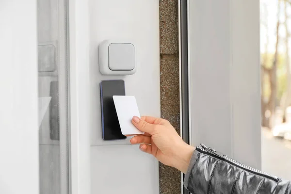 Woman Opening Door Security Card — Stock Photo, Image