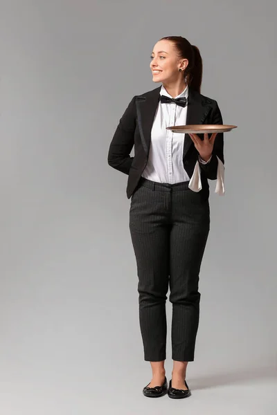 Beautiful Female Waiter Grey Background — Stock Photo, Image