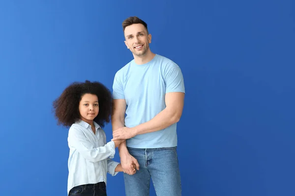 Happy Man Little Adopted Girl Color Background — Stock Photo, Image