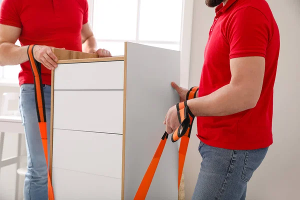 Loaders Carrying Furniture Using Cargo Belts — Stock Photo, Image