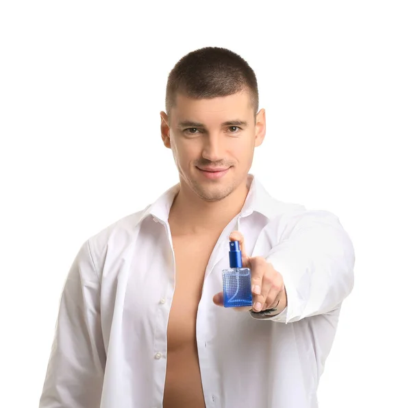 Stilig Ung Man Med Flaska Parfym Vit Bakgrund — Stockfoto