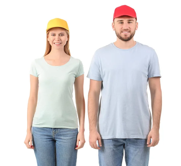 Pareja Joven Elegantes Gorras Sobre Fondo Blanco — Foto de Stock