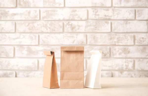 Paper Bags Table Light Background — Stock Photo, Image
