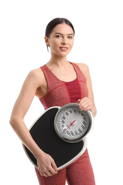白い背景に体重計を持つ若い女性 — ストック写真