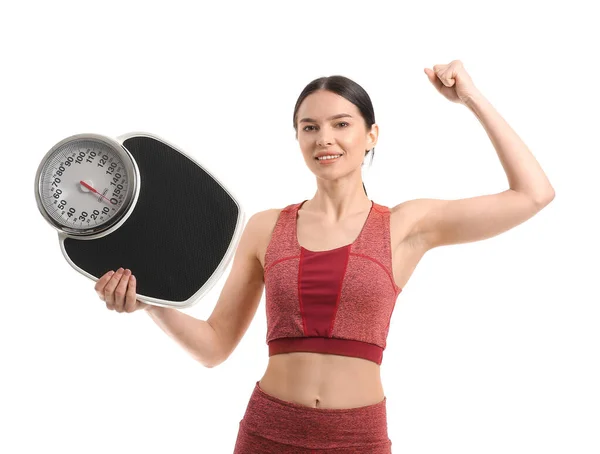 白い背景に体重計を持つ若い女性 — ストック写真