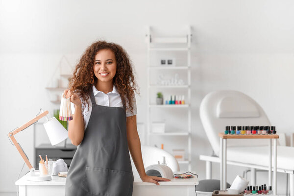 Portrait of manicure master in beauty salon