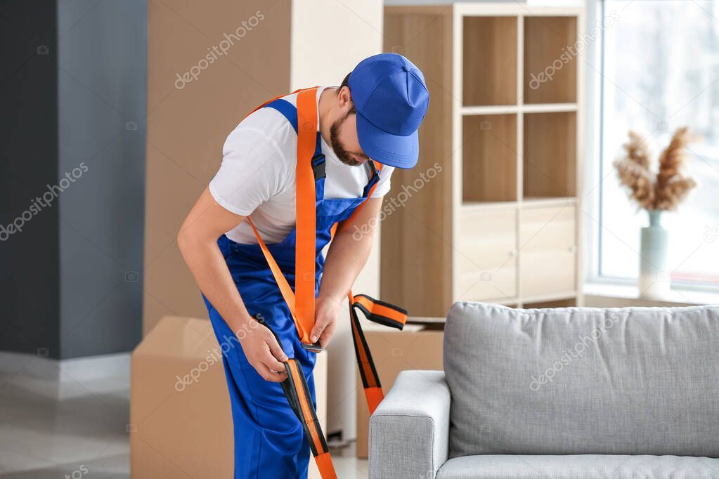 Loader using cargo belts for carrying furniture