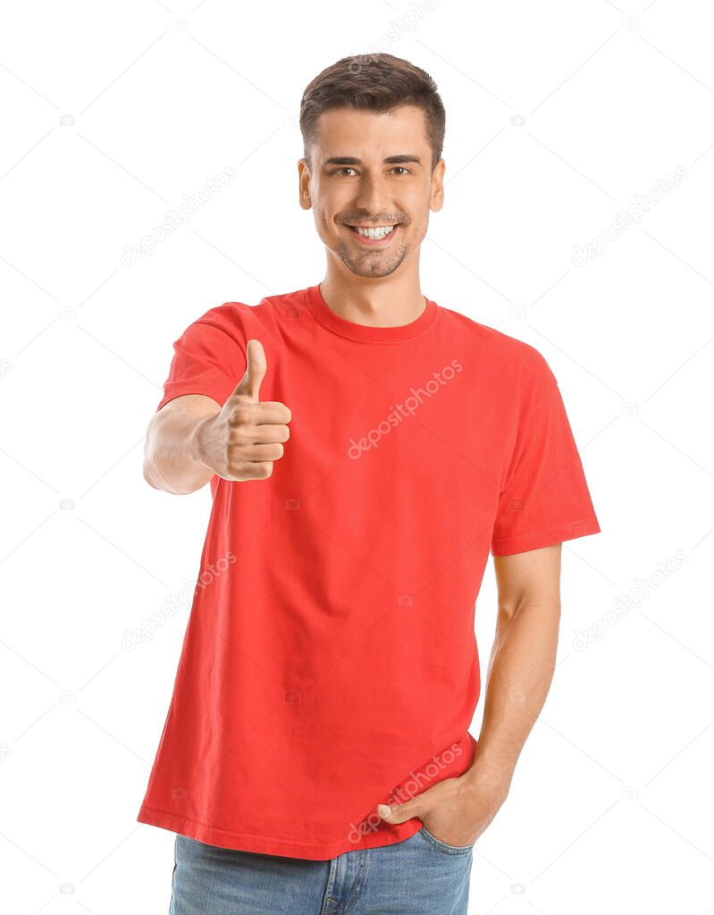Man in stylish t-shirt showing thumb-up on white background