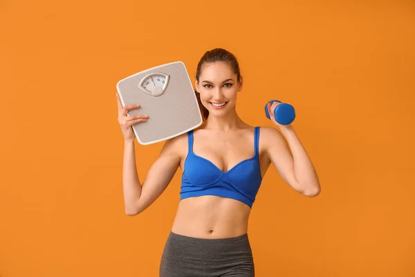 Young Woman Weight Scales Dumbbell Color Background — Stock Photo, Image