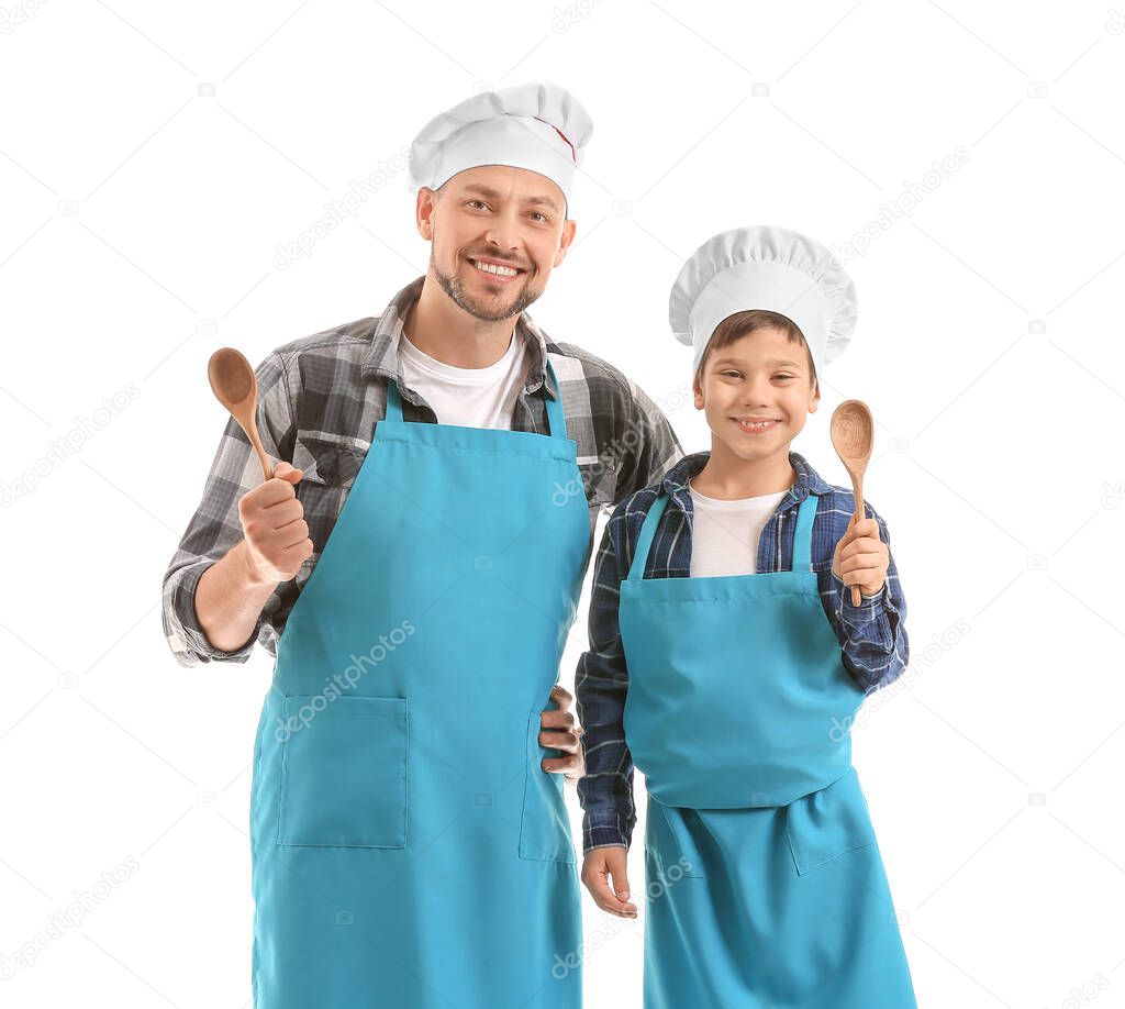 Portrait of male chef and his little son on white background