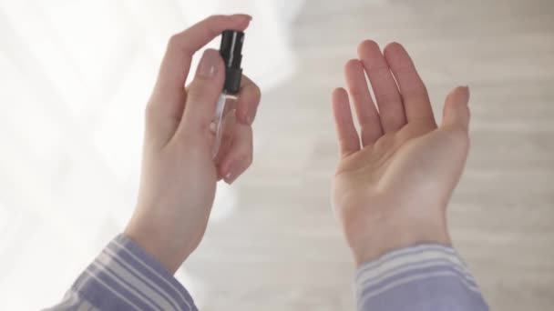 Woman Using Sanitizer Home — Stock Video