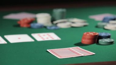 Man playing poker in casino, closeup