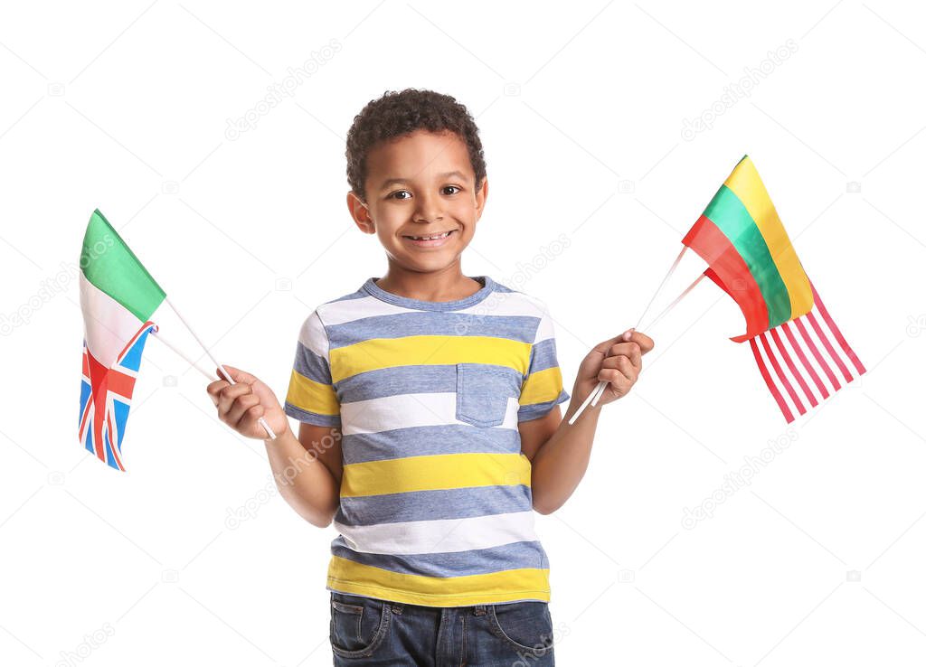 Little African-American pupil of language school on white background