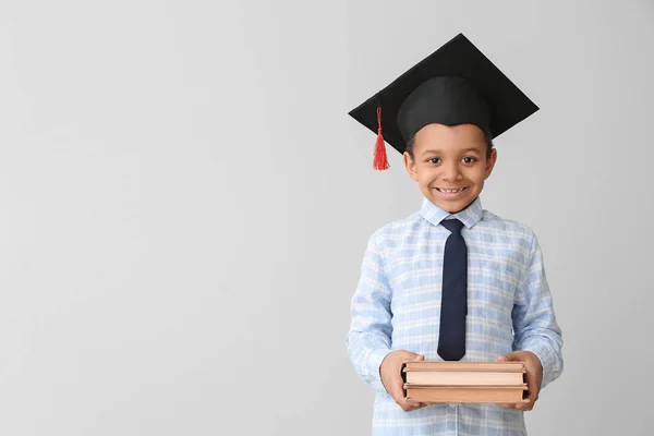 Little African American Boy Graduation Hat Books Grey Background — Stock Photo, Image