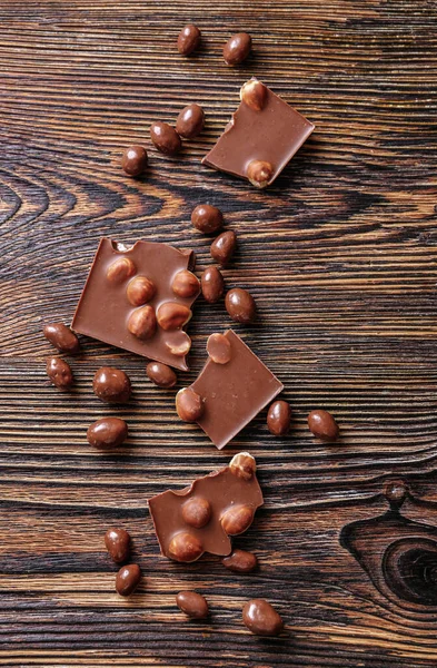 Tasty Chocolate Hazelnuts Wooden Background — Stock Photo, Image